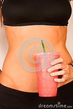 Slender Female Torso Tanned Toned Body Blended Fruit Smoothie Stock Photo