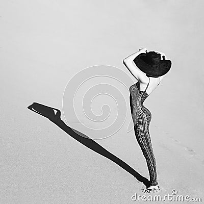 Slender young woman in overall a fine ornament Stock Photo