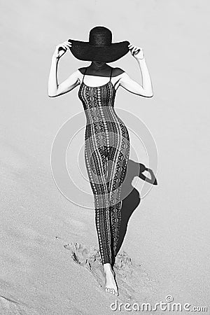 Slender young woman in overall a fine ornament Stock Photo