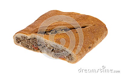 Slice of baked steak stromboli on a white background Stock Photo