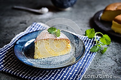 Delicious Japanese cheesecake with powdered sugar icing Stock Photo