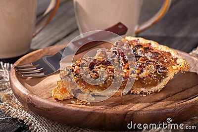 Slice of Delicious Pecan Pie Stock Photo