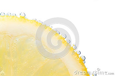 Slice of fresh lemon with fizz bubbles Stock Photo