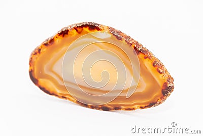 Slice of gem thin cut piece in different tones of yellow and orange and natural surface Stock Photo