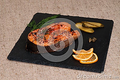 Slice of grilled salmon with Dijon mustard. Stock Photo