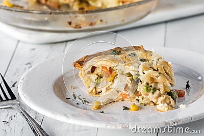 A slice of homemade turkey pot pie, ready for eating. Stock Photo