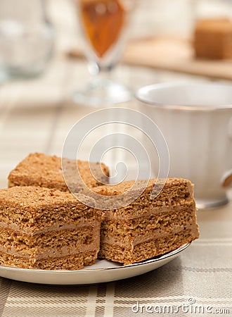 Slice of layered honey cake Stock Photo