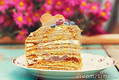 Slice of layered honey cake Stock Photo