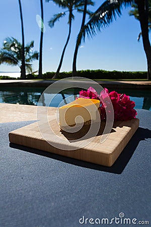 Slice of lilikoi cheesecake on a beautiful Hawaiian day Stock Photo