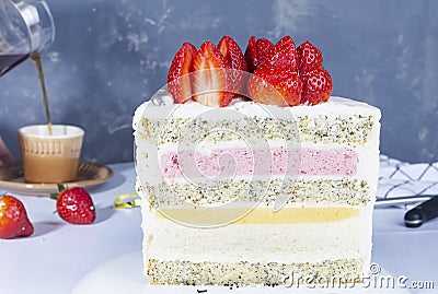 Slice of mouth-watering strawberry cake on gray concrete background. Summer cake Stock Photo