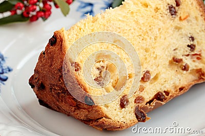 Slice Panettone Christmas cake on plate gold Stock Photo