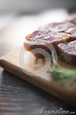 Slice of red smoked fish and dill Stock Photo