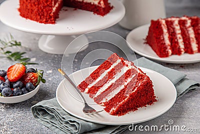 Slice of Red Velvet cake on white plate Stock Photo