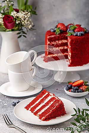 Slice of Red Velvet cake on white plate Stock Photo