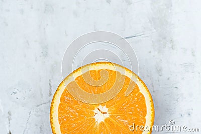 Slice of Ripe Juicy Vibrant Vivid Color Orange on Gray Stone Concrete Metal Background. High Resolution Food Poster. Vitamins Stock Photo
