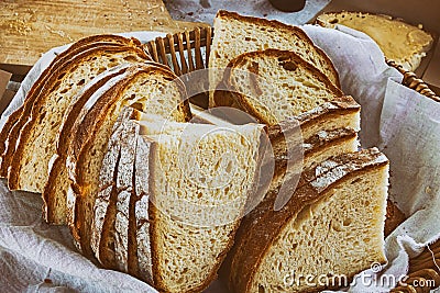 Slice of rustic bread set basket delicious fresh background Stock Photo