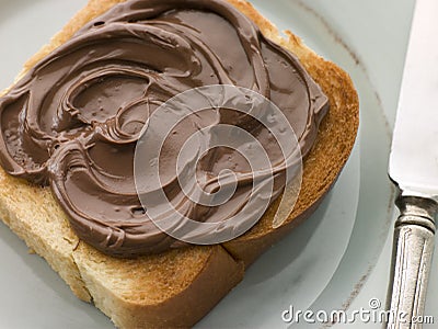 Slice of Toasted brioche with Chocolate Spread Stock Photo