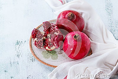 Slice and whole pomegranates Stock Photo