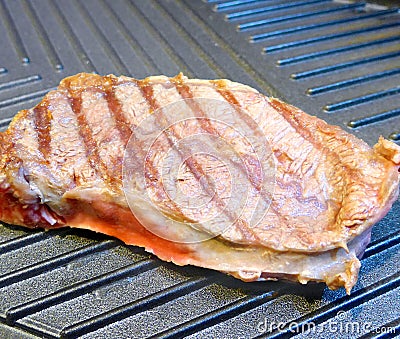 Sliced beef roasting Stock Photo