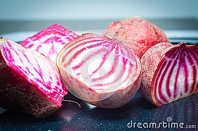 Sliced Candy Cane Beets, also known as Chioggia Beets, arranged on a baking tray. Stock Photo