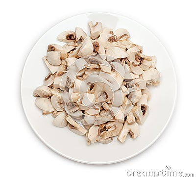 Sliced champignon mushrooms in plate Stock Photo