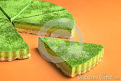 Sliced cheesecake made with matcha green powder Stock Photo