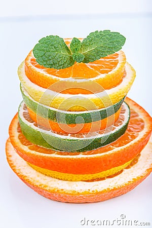 Sliced citrus: oranges, mandarines, lemons, limes, sweetie, grapefruits, witch's broom close-up macro Stock Photo