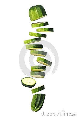 Sliced Courgette (Zucchini) Flying on White Stock Photo