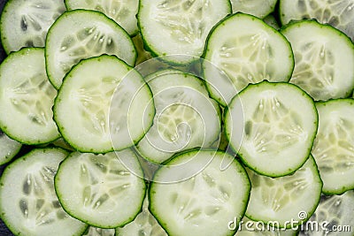 Sliced cucumber on the black slate board Stock Photo