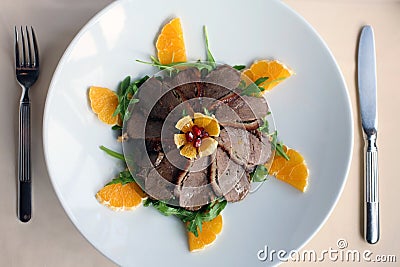 Sliced duck with oranges Stock Photo