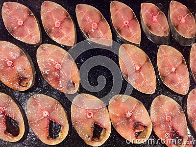 Sliced Fishes Top View Flat Lay On Black Table Pan Stock Photo