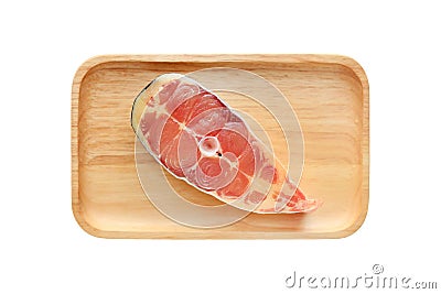 Sliced fresh Iridescent shark or Striped catfish on wooden plate isolated on white background Stock Photo