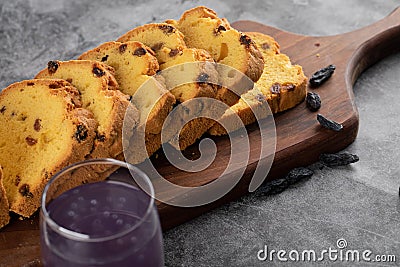 Sliced homemade roulette cake with grape cocktail Stock Photo