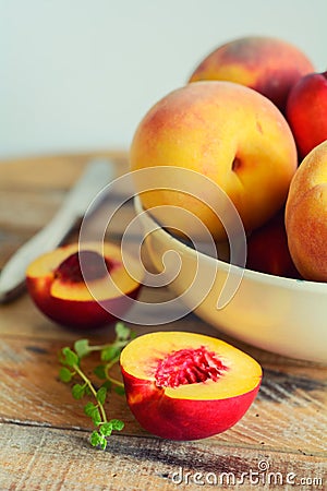 Sliced juicy peach in dish Stock Photo