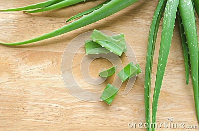 sliced and leaf of fresh aloe vera on wood Stock Photo