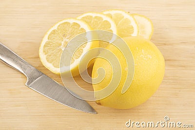 Sliced lemon and knive Stock Photo