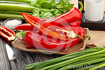 Sliced long pepper on wood Stock Photo