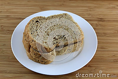 Sliced multigrain Bread on the white plate Stock Photo