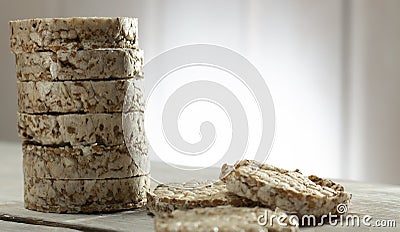 Sliced Oatmeal Bread on Wooden Table close-up Stock Photo