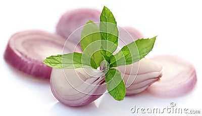 Sliced onion with mint leaves Stock Photo