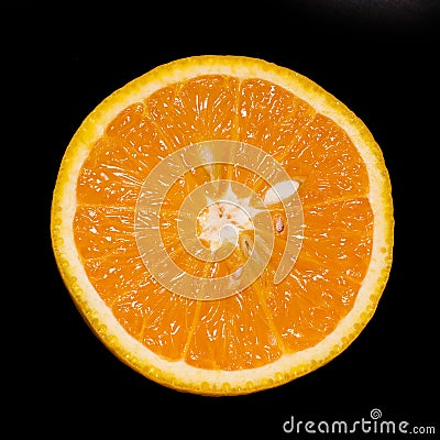 Sliced orange isolated on black Stock Photo