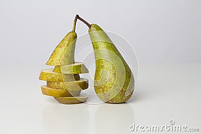 Sliced pear and whole pear Stock Photo