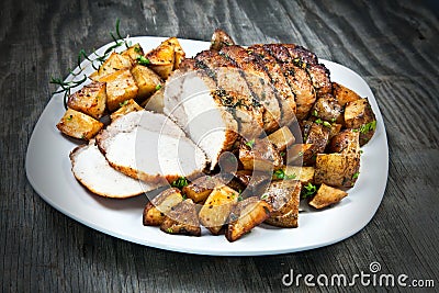 Sliced Roast Pork Loin on a Platter Stock Photo