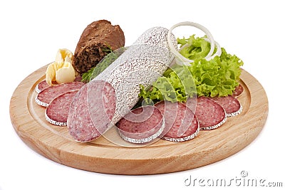 Sliced sausage with bread, butter and vegetables Stock Photo