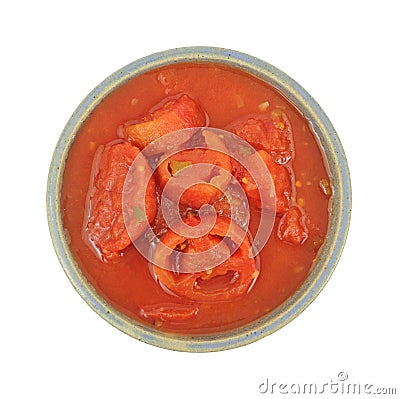 Sliced stewed tomatoes in old bowl Stock Photo