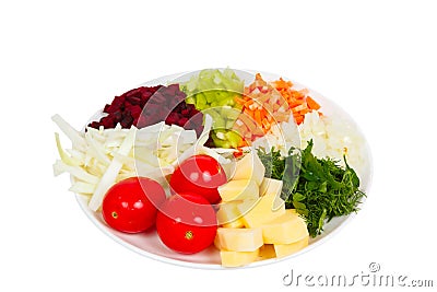 Sliced ??vegetables on a plate isolated Stock Photo