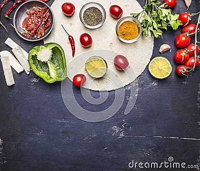 Sliced vegetables on tortilla, Ingredients for cooking burritos border with text area on wooden rustic background top view horizon Stock Photo