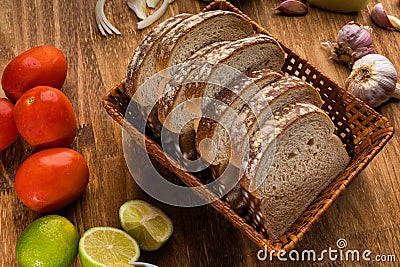 Sliced white bread with wheat flour on a wooden table. Chamado PÃ£o de forma Stock Photo