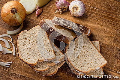 Sliced white bread with wheat flour on a wooden table. Chamado PÃ£o de forma Stock Photo