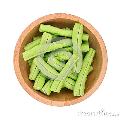 Sliced yard long bean in the wooden bowl isolated on white Stock Photo